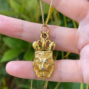 Anne Klein lions head gold tone pendant and brand new Monet gold tone chain